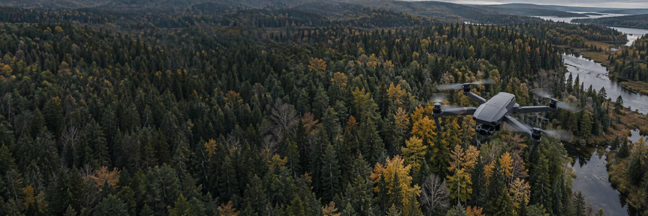Illustration of a DJI Matrice 400 above a forest and river.